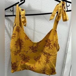 Yellow floral crop top with adjustable ribbons